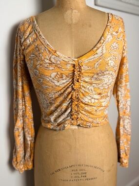 Free People stretchy crop top long sleeves XS orange tan and white
